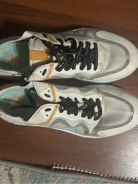 Nike lucent size 11 White Sneakers with Teal and Gold Accents